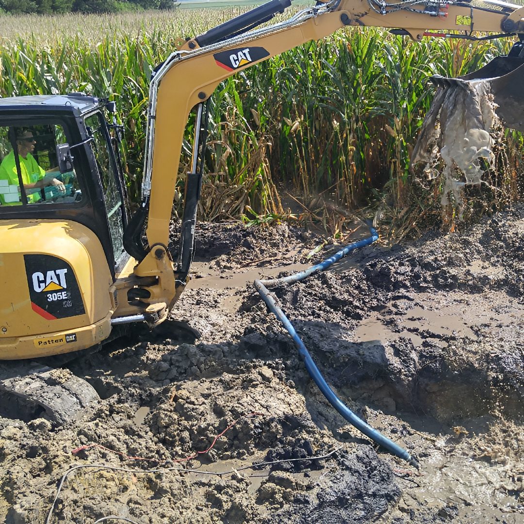 Construction equipment in muddy area