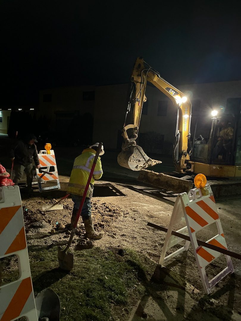 Excavation work under bright lights