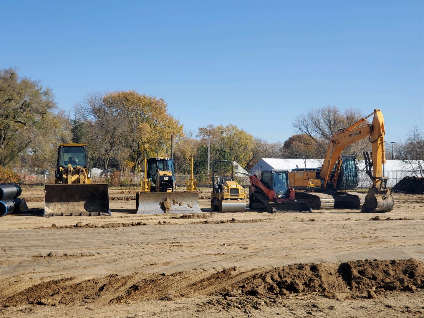 Heavy machinery parked on construction ground